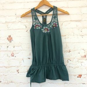 Stunning bohemian Free People racer back top with embroidered flower details